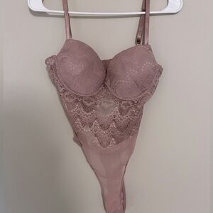 Never worn pink lace bodysuit with built in cups